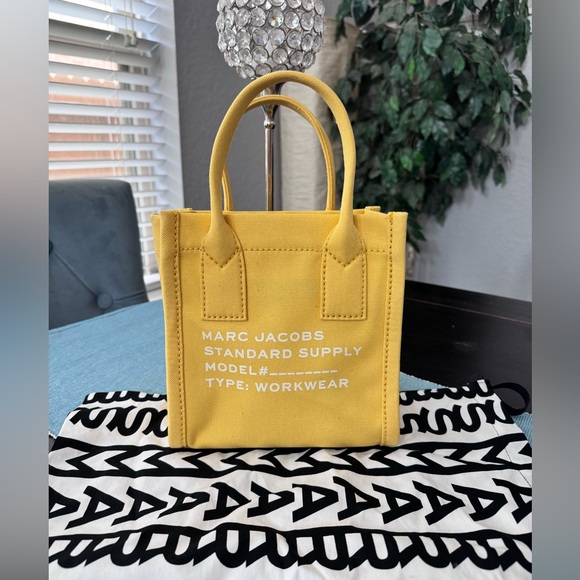 Marc Jacobs Handbags - Marc Jacobs Small Canvas Standard Supply Tote in yellow.